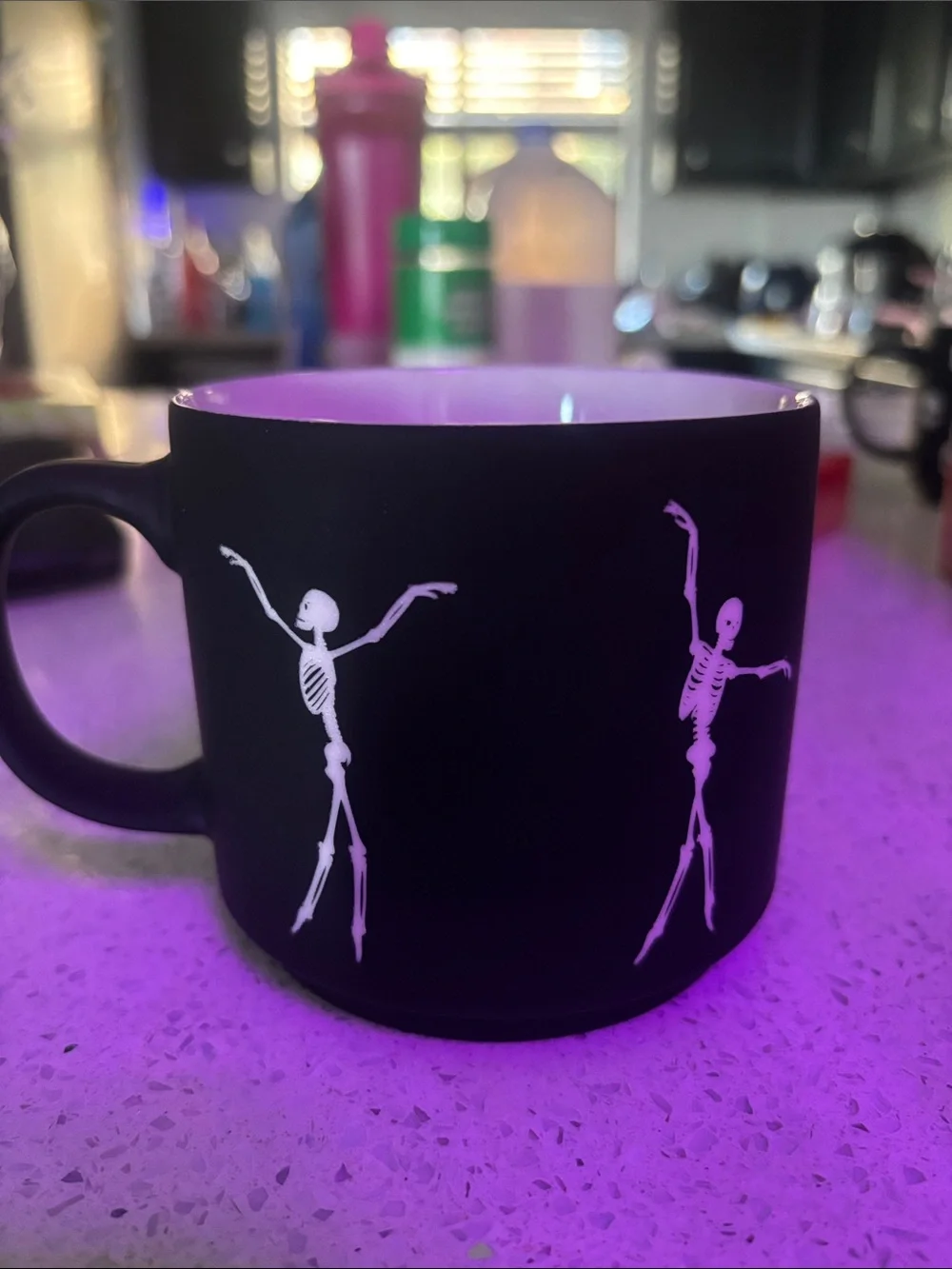 Matte Black Ceramic Mug with Dancing Skeletons - White Interior